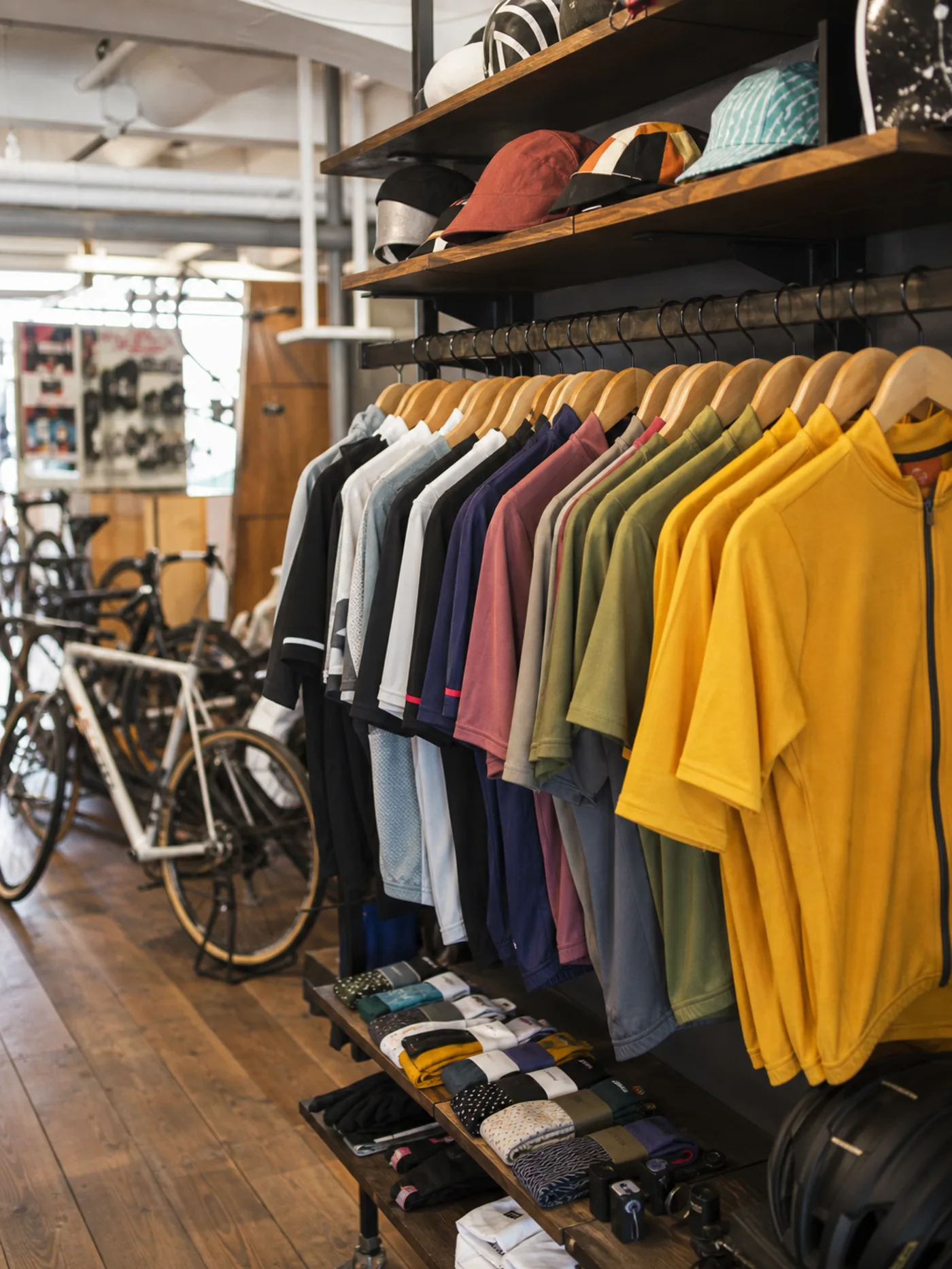 Bicycle store display rack with jerseys and accessories