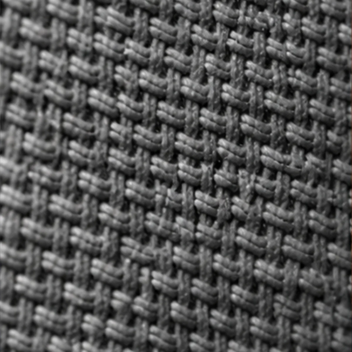 Close-up of the hip and outer-thigh panel fabric and seam on technical mountain bike riding apparel