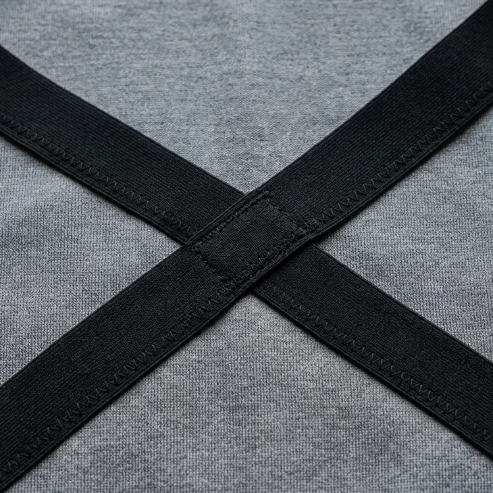 Structure card: a coated woven face catching light across its creases